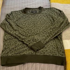 green cheetah pullover